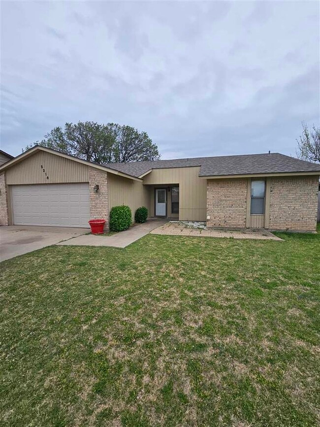 property at 5216 NW Ashby Ave