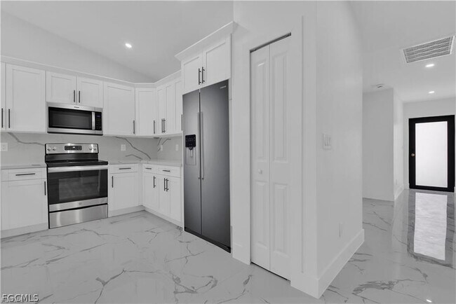 property at 4921 Leonard Blvd S