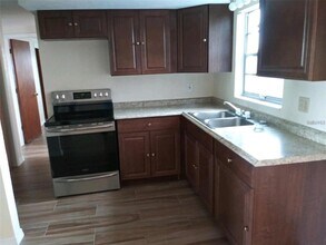 4030 Chesswood Dr in Holiday, FL - Foto de edificio - Building Photo