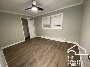 1321 W Sherwin Ave, Unit 1B in Chicago, IL - Building Photo - Building Photo