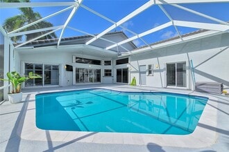 9912 NW 49th Pl in Coral Springs, FL - Building Photo - Building Photo