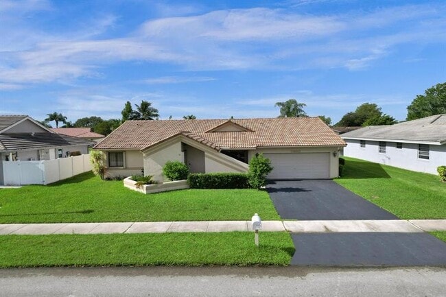 property at 7680 NW 23rd St