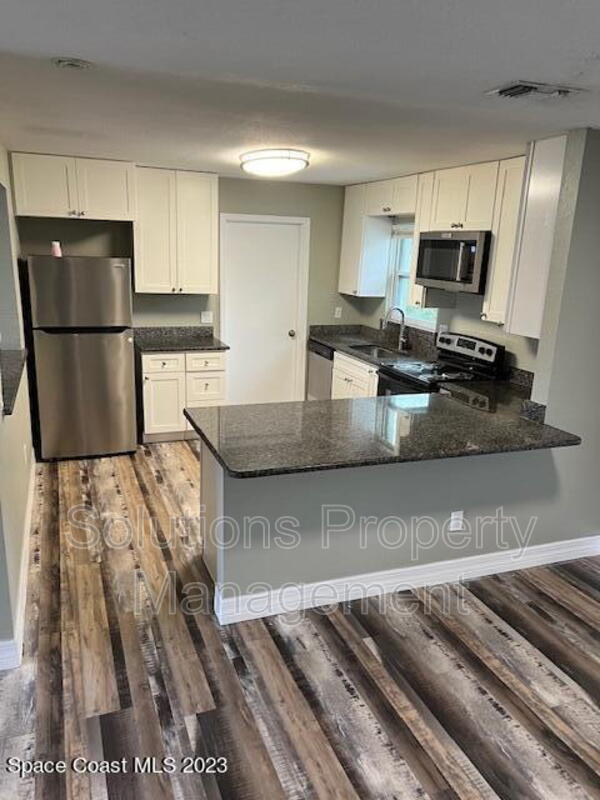 1716 Ixora Dr W in Melbourne, FL - Building Photo - Building Photo