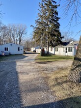 9762 River Rd, Unit #1 in Clay, MI - Building Photo - Building Photo