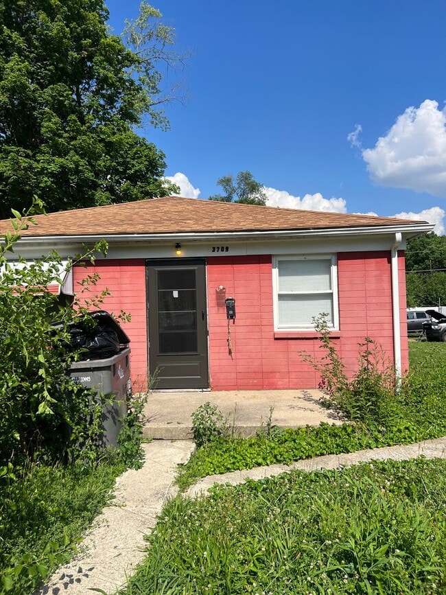 property at 3709-3711 Kinnear Ave
