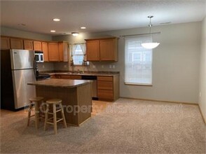 1135 Redstone Ln in Pleasant Hill, IA - Building Photo - Building Photo