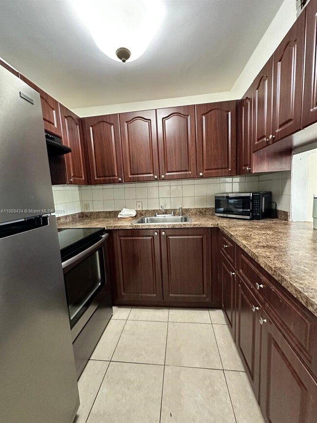 property at 4848 NW 24th Ct