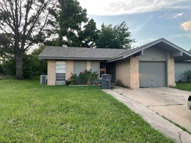 property at 8423 E 24th St