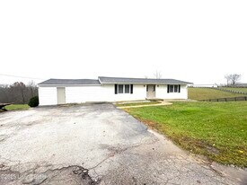 9909 Mt Eden Rd in Waddy, KY - Building Photo
