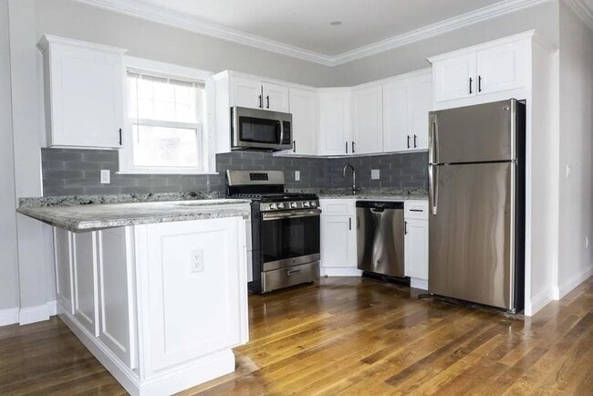 property at 9-11 Woodside Ave