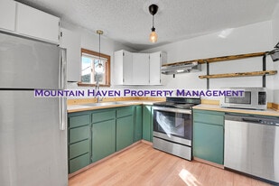 26147 South End Rd in Kittredge, CO - Building Photo