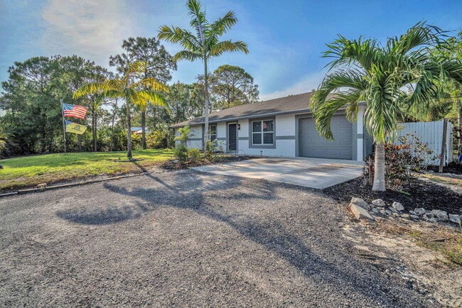 18143 42nd Rd N in The Acreage, FL - Building Photo - Building Photo