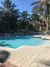 8000 N Nob Hill Rd in Tamarac, FL - Building Photo - Building Photo