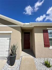 1987 Cacutta Wy in Kissimmee, FL - Foto de edificio - Building Photo