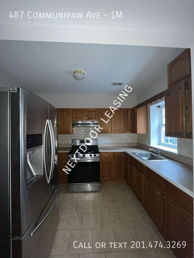 property at 487 Communipaw Ave