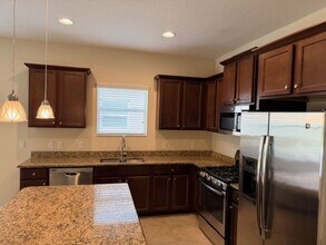 4620 Whispering Leaves Dr in Sarasota, FL - Building Photo - Building Photo