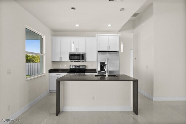 property at 2481 NW 9th St