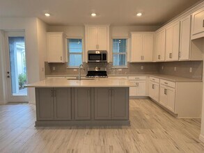 12767 Harvest Rain Ave in Oakland, FL - Building Photo - Building Photo