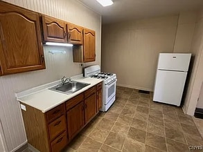 321-25 N Midler Ave in Syracuse, NY - Building Photo - Building Photo