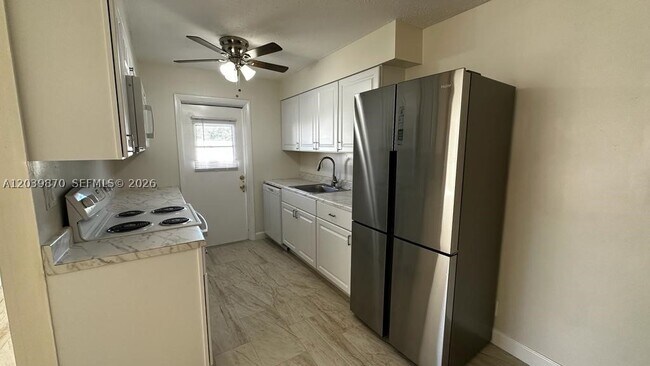 property at 7480 SW 10th St