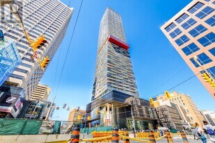 8 Eglinton Ave E in Toronto, ON - Building Photo