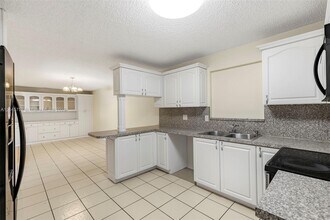 5070 Ponderosa Ln in Haverhill, FL - Building Photo - Building Photo