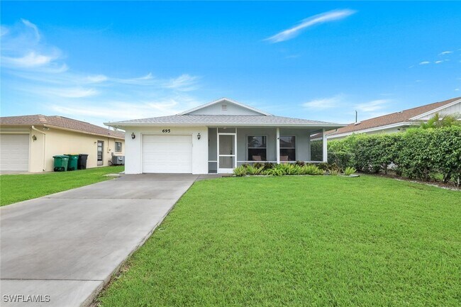 property at 695 104th Ave N