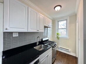 655 W Roscoe St, Unit A07W in Chicago, IL - Building Photo - Building Photo