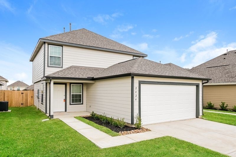 2424 Carp Dr in Conroe, TX - Building Photo