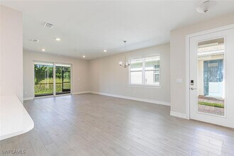 1050 Enbrook Lp in Naples, FL - Building Photo - Building Photo