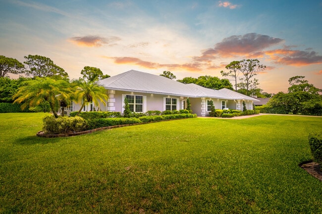 property at 7903 Plantation Lakes Dr