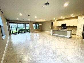17021 Ashcomb Wy in Estero, FL - Building Photo - Building Photo