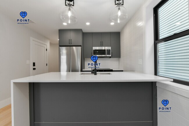 516 Sumner St, Unit 3 in Boston, MA - Foto de edificio - Building Photo