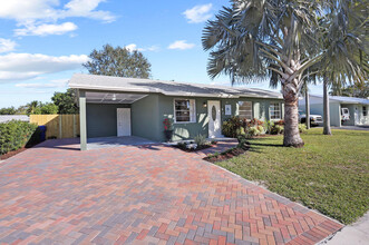 1009 Mohican Blvd in Jupiter, FL - Foto de edificio - Building Photo