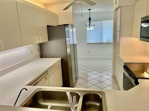 9587 Weldon Cir in Tamarac, FL - Building Photo - Building Photo