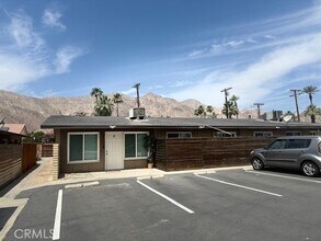 51099 Eisenhower Dr, Unit 1 in La Quinta, CA - Building Photo - Building Photo