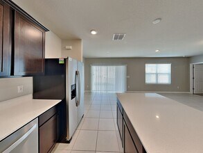 1151 Sugarwood St in Davenport, FL - Foto de edificio - Building Photo