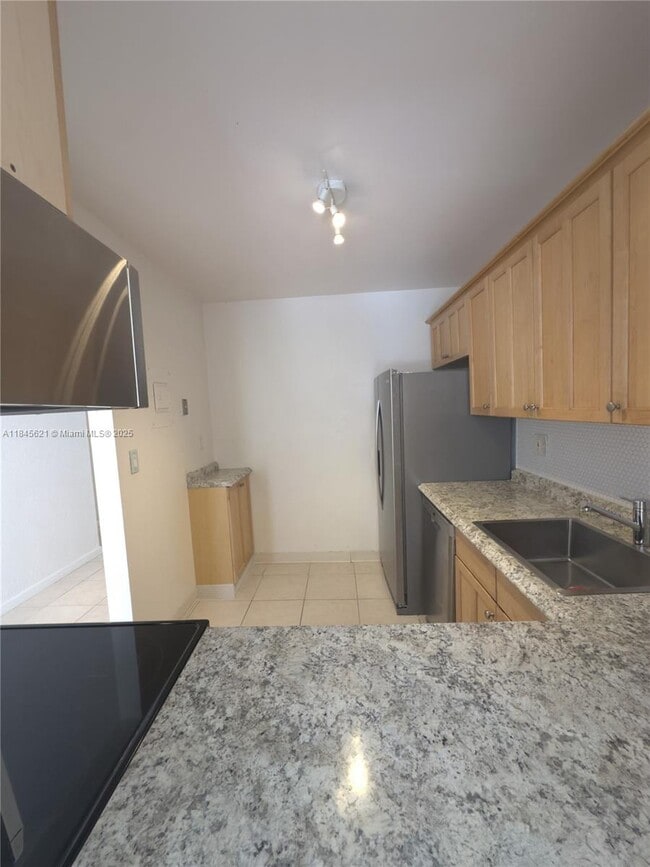 property at 12290 NE 11th Ct
