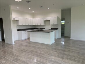 1027 Eisenhower Blvd in Lehigh Acres, FL - Building Photo - Building Photo