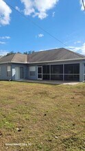 1211 SW Wellington Ave in Port St. Lucie, FL - Foto de edificio - Building Photo