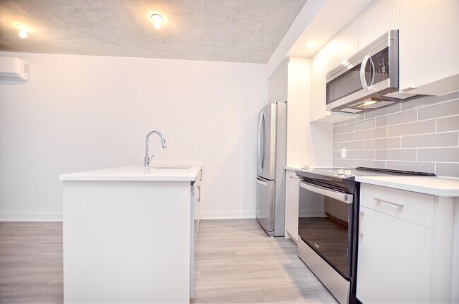 1-1404 Av. de la Gare in Mascouche, QC - Building Photo - Building Photo