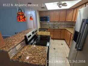 8522 N Atlantic Ave in Cape Canaveral, FL - Building Photo - Building Photo