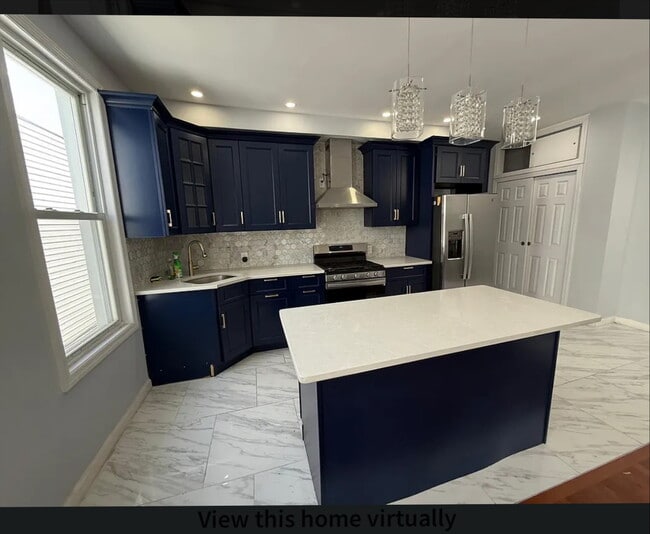 property at 70-11-11 69th Pl