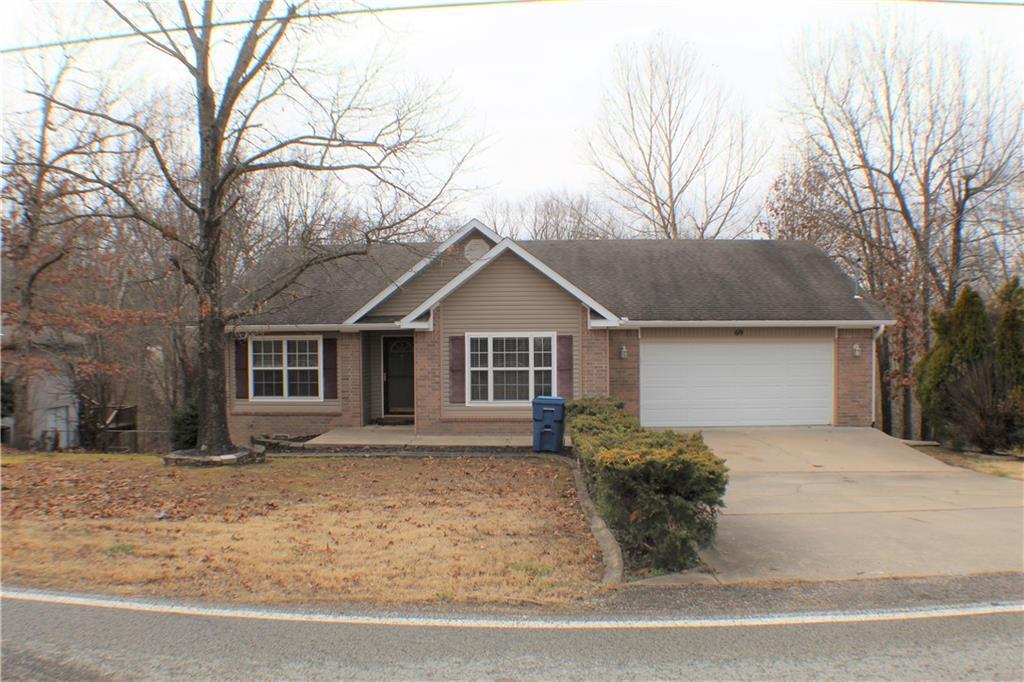 69 Sherlock Dr in Bella Vista, AR - Foto de edificio