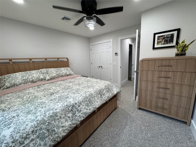 49 Canoe Place Rd in Hampton Bays, NY - Building Photo - Building Photo