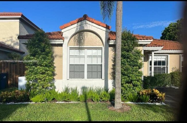 property at 5596 NW 102nd Ct
