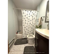 11 Henshaw St, Unit 1 in Boston, MA - Foto de edificio - Building Photo