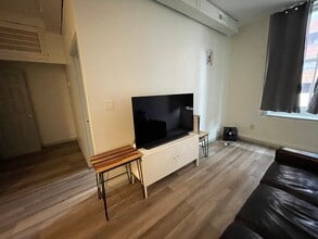1013 St Paul St, Unit 2F in Baltimore, MD - Building Photo - Building Photo