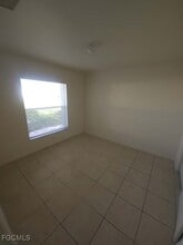 1122 Harry Ave S in Lehigh Acres, FL - Foto de edificio - Building Photo