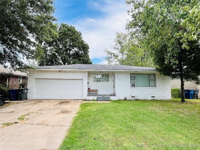 property at 233 S 102nd E Ave